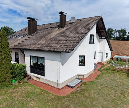 Großzügiges Einfamilienhaus mit pflegeleichtem Garten am Ortsrand von Erlau/Walsdorf